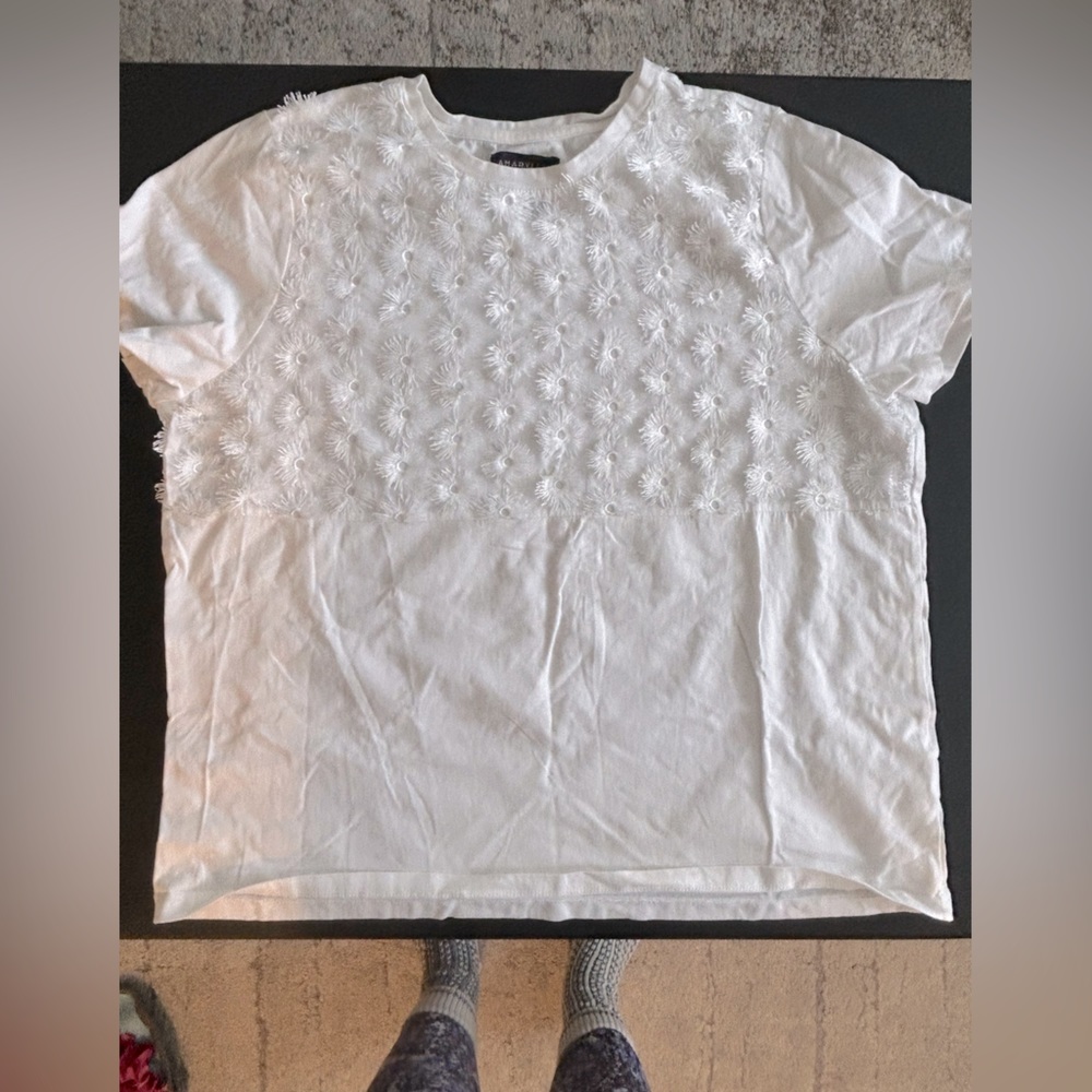 White tee with floral design